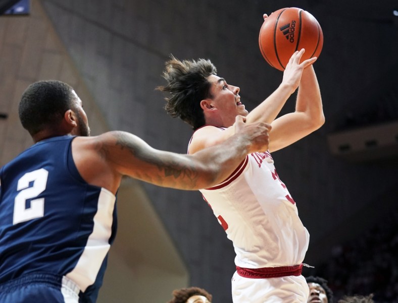 Jan 26, 2022; Bloomington, Indiana, USA;  Indiana Hoosiers guard Trey Galloway (32) is fouled by Penn State Nittany Lions guard Myles Dread (2) during the game at Simon Skjodt Assembly Hall. Mandatory Credit: Robert Goddin-USA TODAY Sports