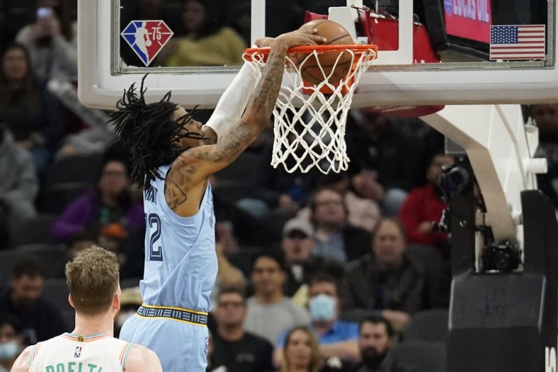 Jan 26, 2022; San Antonio, Texas, USA; Memphis Grizzlies guard Ja Morant (12) dunks during the second half against the San Antonio Spurs at AT&T Center. Mandatory Credit: Scott Wachter-USA TODAY Sports