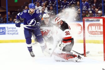 Jan 27, 2022; Tampa, Florida, USA; New Jersey Devils goaltender Jon Gillies (32) makes a save against the Tampa Bay Lightning during the first period at Amalie Arena. Mandatory Credit: Kim Klement-USA TODAY Sports
