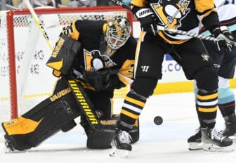 Jan 27, 2022; Pittsburgh, Pennsylvania, USA; Pittsburgh Penguins goalie Tristan Jarry (35) makes a save against the Seattle Kraken during the first periuod at PPG Paints Arena. Mandatory Credit: Philip G. Pavely-USA TODAY Sports