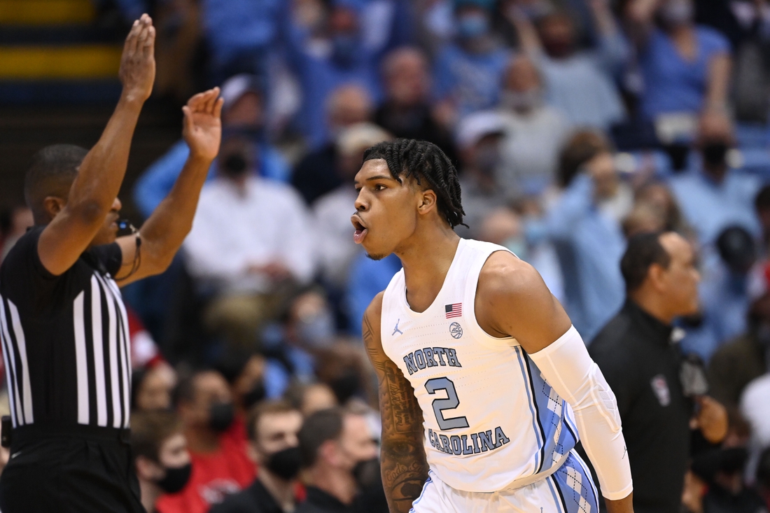 Jan 29, 2022; Chapel Hill, North Carolina, USA;  North Carolina Tar Heels guard Caleb Love (2) reacts after hitting a three point shot in the first half at Dean E. Smith Center. Mandatory Credit: Bob Donnan-USA TODAY Sports