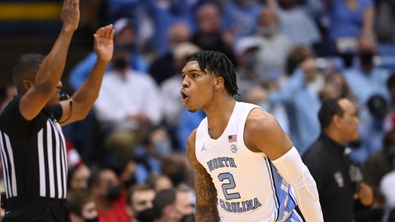 Jan 29, 2022; Chapel Hill, North Carolina, USA;  North Carolina Tar Heels guard Caleb Love (2) reacts after hitting a three point shot in the first half at Dean E. Smith Center. Mandatory Credit: Bob Donnan-USA TODAY Sports