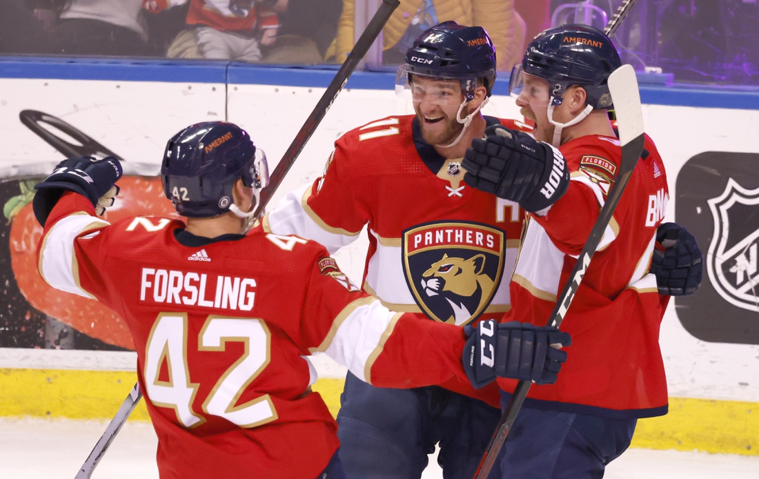 Florida Panthers center Aleksander Barkov (16) looks up after scoring a  goal during the third period of an NHL hockey game against the San Jose  Sharks, Saturday, Jan. 29, 2022, in Sunrise