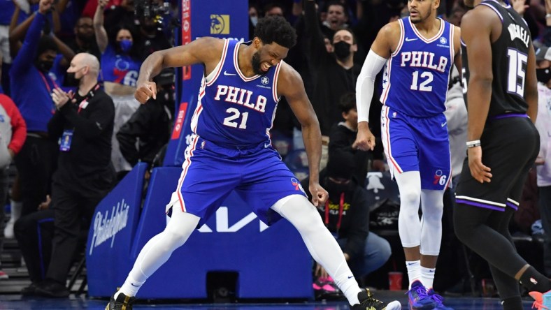 Jan 29, 2022; Philadelphia, Pennsylvania, USA; Philadelphia 76ers center Joel Embiid (21) celebrates after defeating against the Sacramento Kings at Wells Fargo Center. Mandatory Credit: Eric Hartline-USA TODAY Sports