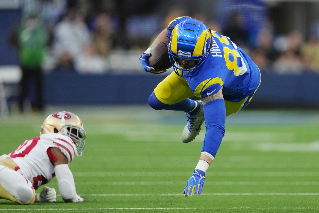 Jan 30, 2022; Inglewood, California, USA; Los Angeles Rams tight end Tyler Higbee (89) is upended by the San Francisco 49ers in the first half during the NFC Championship Game at SoFi Stadium. Mandatory Credit: Kirby Lee-USA TODAY Sports