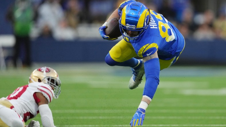 Jan 30, 2022; Inglewood, California, USA; Los Angeles Rams tight end Tyler Higbee (89) is upended by the San Francisco 49ers in the first half during the NFC Championship Game at SoFi Stadium. Mandatory Credit: Kirby Lee-USA TODAY Sports