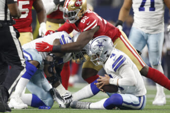 Dec 13, 2020; East Rutherford, New Jersey, USA; New York Giants offensive tackle Andrew Thomas (top) recovers a fumble by quarterback Daniel Jones (8) against Arizona Cardinals defensive end Zach Allen (right) during the second half at MetLife Stadium. Mandatory Credit: Robert Deutsch-USA TODAY Sports