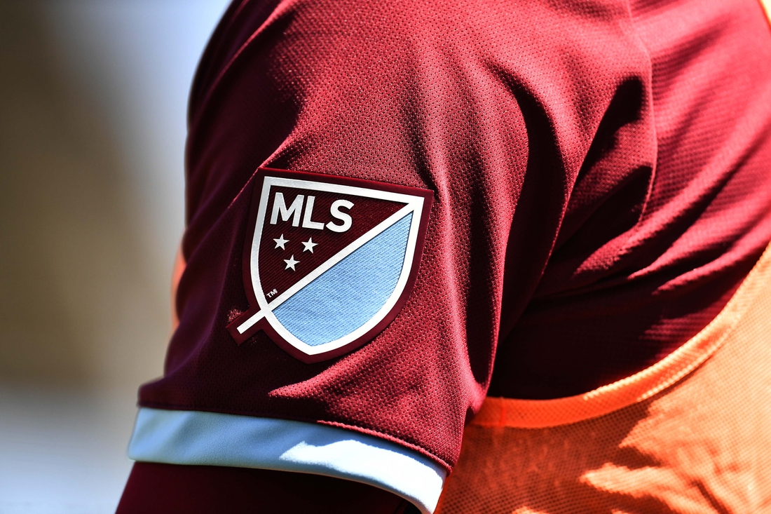 Apr 14, 2018; Commerce City, CO, USA; Detailed view of Colorado Rapids midfielder Dillon Serna (17) MLS emblem logo in the first half of the match against the Toronto FC at Dick's Sporting Goods Park. Mandatory Credit: Ron Chenoy-USA TODAY Sports