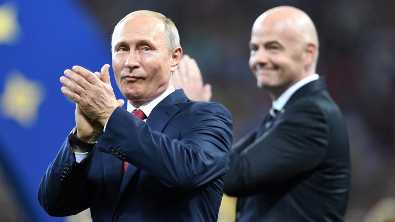 July 15, 2018; Moscow, Russia; Russia president Vladimir Putin and FIFA president Gianni Infantino present the trophy to France after the final of the FIFA World Cup 2018 against Croatia at Luzhniki Stadium. Mandatory Credit: Tim Groothuis/Witters Sport via USA TODAY Sports