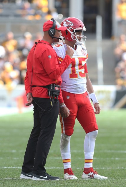 Sep 16, 2018; Pittsburgh, PA, USA;  Kansas City Chiefs quarterbacks coach Mike Kafka (L) talks with quarterback Patrick Mahomes (15) against the Pittsburgh Steelers during the third quarter at Heinz Field. The Chiefs won 42-37. Mandatory Credit: Charles LeClaire-USA TODAY Sports