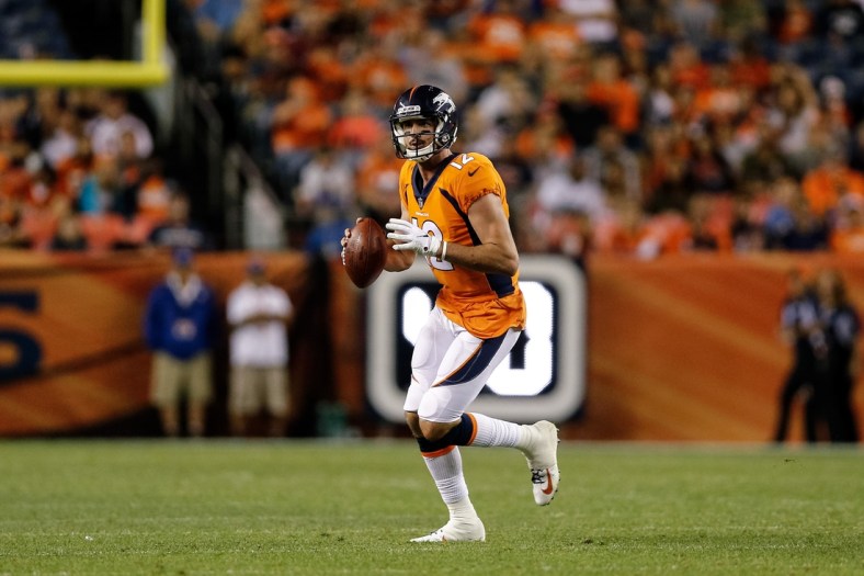 Aug 18, 2018; Denver, CO, USA; Denver Broncos quarterback Paxton Lynch (12) in the fourth quarter against the Chicago Bears at Broncos Stadium at Mile High. Mandatory Credit: Isaiah J. Downing-USA TODAY Sports