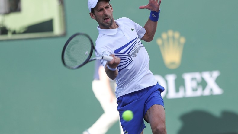 Novak Djokovic and Fabio Fognini play doubles against Lukasz Kubot and Marcelo Melo during the doubles semifinal match at the BNP Paribas Open in Indian Wells, March 15, 2019. 

Bnp Paribas Open March 15 7