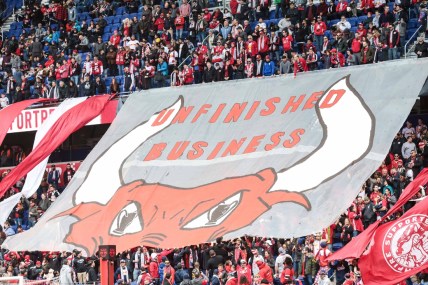 Mar 16, 2019; Harrison, NJ, USA; New York Red Bulls fans unveil a banner that reads "Unfinished Business"  before the game against the San Jose Earthquakes at Red Bull Arena. Mandatory Credit: Vincent Carchietta-USA TODAY Sports
