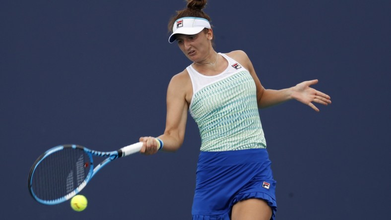 Mar 21, 2019; Miami Gardens, FL, USA; Irina-Camelia Begu of Romania hits a forehand against Bianca Andreescu of Canada (not pictured) in the first round of the Miami Open at Miami Open Tennis Complex. Mandatory Credit: Geoff Burke-USA TODAY Sports