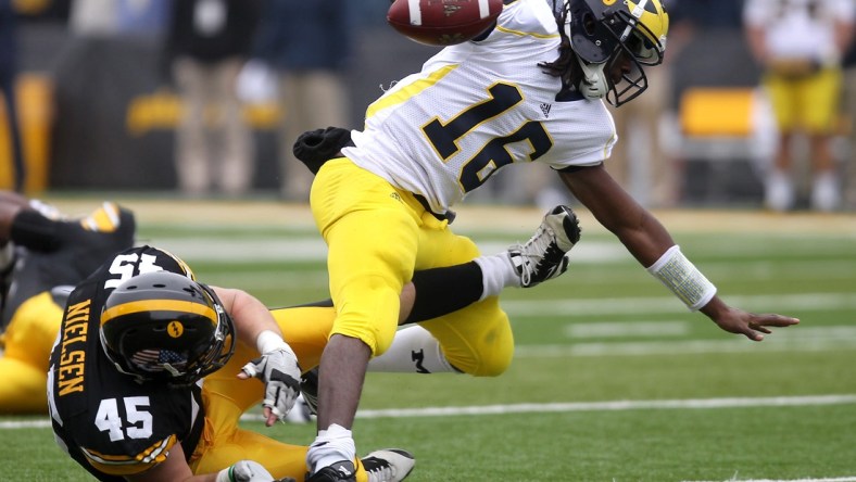 Tyler Nielsen trips up Michigan quarterback Denard Robinson in a game played Nov. 5, 2011 in Iowa City.

Iowbrd 11 06 2011 Pc 1 B005 2011 11 05 Img Iow 1106 Ia Vs Mich 1 1 Aoieg4p Img Iow 1106 Ia Vs Mich 1 1 Aoieg4p