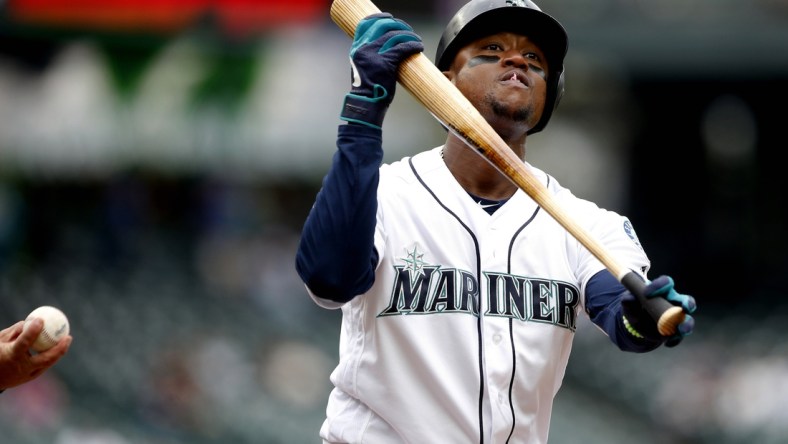 Jul 27, 2019; Seattle, WA, USA; Seattle Mariners left fielder Tim Beckham (1) reacts after striking out against the Detroit Tigers during the second inning at T-Mobile Park. Mandatory Credit: Jennifer Buchanan-USA TODAY Sports