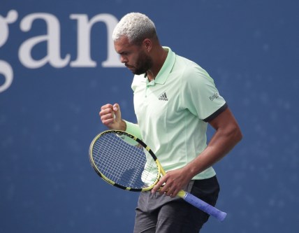 Aug 27, 2019; Flushing, NY, USA; Jo-Wilfried Tsonga of France reacts after winning a point against Tennys Sandgren of the United States in a first round match on day two of the 2019 U.S. Open tennis tournament at USTA Billie Jean King National Tennis Center. Mandatory Credit: Jerry Lai-USA TODAY Sports
