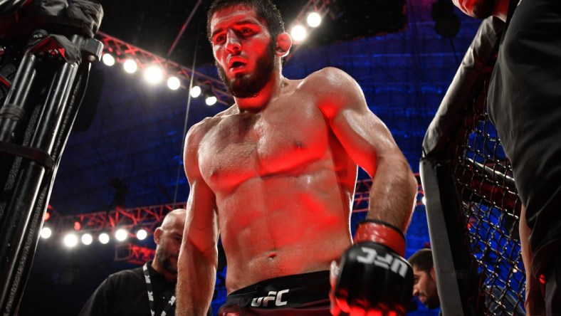 Sep 7, 2019; Abu Dhabi, UAE; Islam Makhachev (red gloves) against Davi Ramos (not pictured) during UFC 242 at The Arena. Mandatory Credit: Per Haljestam-USA TODAY Sports