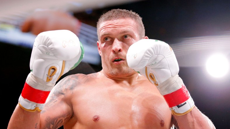 Oct 12, 2019; Chicago, IL, USA; Oleksandr Usyk (white trunks) during his match against Chazz Witherspoon (not pictured) during a heavyweight boxing match at Wintrust Arena. Mandatory Credit: Jon Durr-USA TODAY Sports