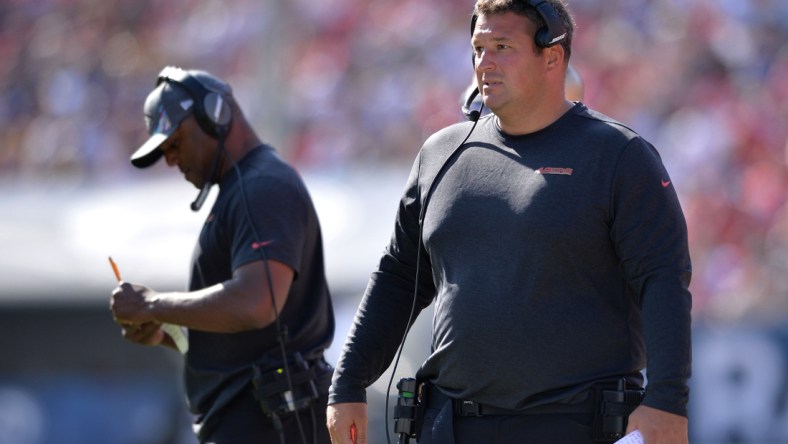 Oct 13, 2019; Los Angeles, CA, USA; San Francisco 49ers coach Chris Kiffin (right) looks on during the second half against the Los Angeles Rams at Los Angeles Memorial Coliseum. Mandatory Credit: Orlando Ramirez-USA TODAY Sports