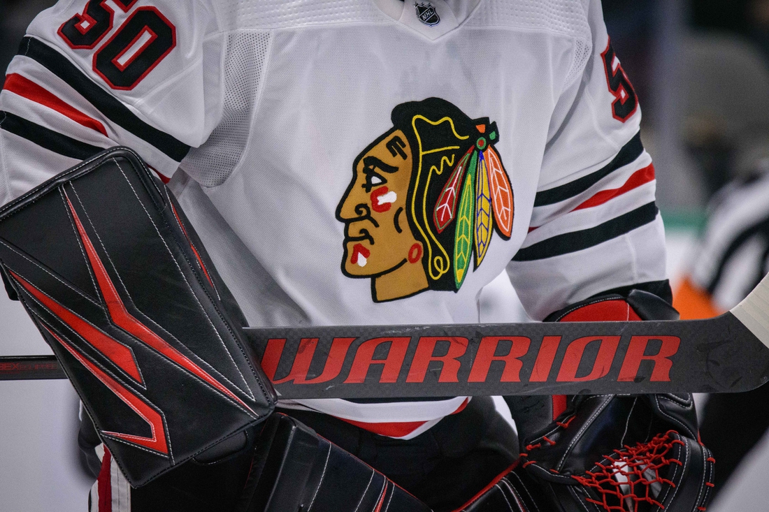 Feb 23, 2020; Dallas, Texas, USA; A view of the logo and hockey stick of Chicago Blackhawks goaltender Corey Crawford (50) in action during the game between the Stars and the Blackhawks at the American Airlines Center. Mandatory Credit: Jerome Miron-USA TODAY Sports