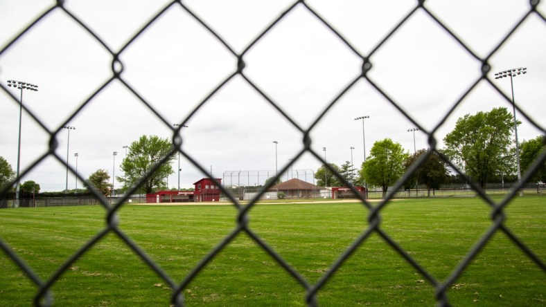 The baseball field for Iowa City High is seen through a chain link fence in center field during the novel coronavirus, COVID-19, pandemic, Wednesday, May 20, 2020, at Mercer Park in Iowa City, Iowa.

200520 Summer Sports 011 Jpg