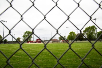 The baseball field for Iowa City High is seen through a chain link fence in center field during the novel coronavirus, COVID-19, pandemic, Wednesday, May 20, 2020, at Mercer Park in Iowa City, Iowa.

200520 Summer Sports 011 Jpg