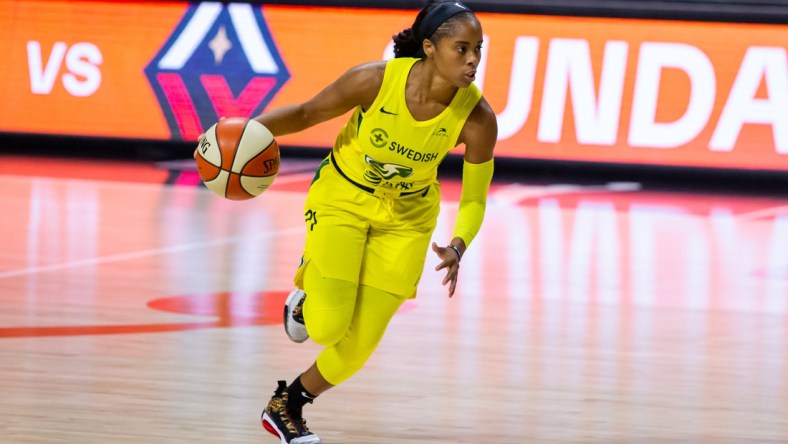 Oct 2, 2020; Bradenton, Florida, USA; Seattle Storm guard Jordin Canada (21) drives during game 1 of the WNBA finals against the Las Vegas Aces at IMG Academy. Mandatory Credit: Mary Holt-USA TODAY Sports