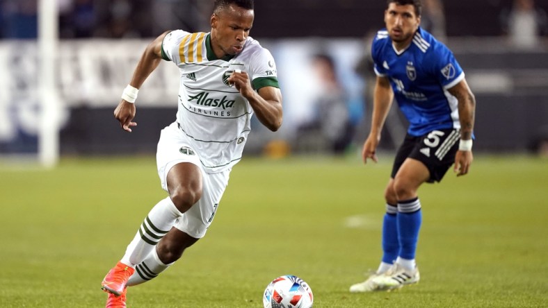 May 15, 2021; San Jose, California, USA; Portland Timbers forward Andy Polo (7) dribbles during the second half against the San Jose Earthquakes at PayPal Park. Mandatory Credit: Darren Yamashita-USA TODAY Sports