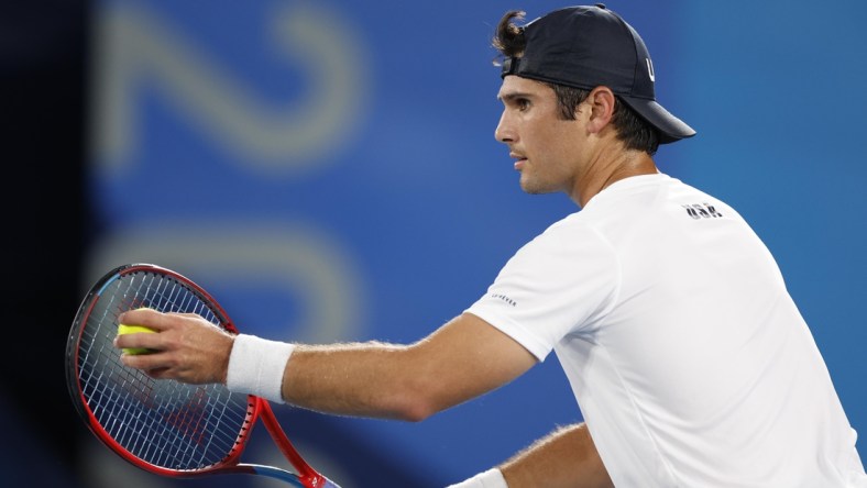 Jul 27, 2021; Tokyo, Japan;  Marcos Giron (USA) in his match against Kei Nishikori (JPN) during the Tokyo 2020 Olympic Summer Games at Ariake Tennis Park. Mandatory Credit: Yukihito Taguchi-USA TODAY Sports