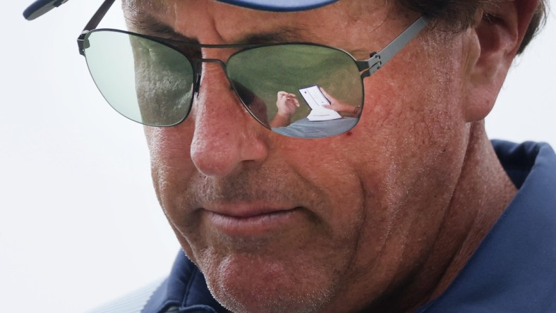 Phil Mickelson takes notes in his pad after playing Hole No. 16 during the second round of the World Golf Championships FedEx-St. Jude Invitational at TPC Southwind  in Memphis, Tenn. on Friday, August 6, 2021.

Jrca6762