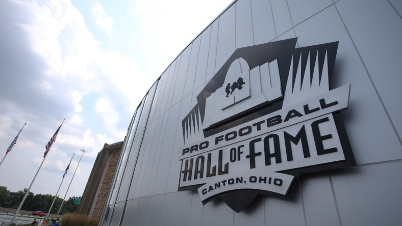 Aug 7, 2021; Canton, Ohio, USA;  General view of signage at the Professional Football Hall of Fame before the HOF enshrinement ceremonies at Tom Benson Hall of Fame Stadium. Mandatory Credit: Charles LeClaire-USA TODAY Sports