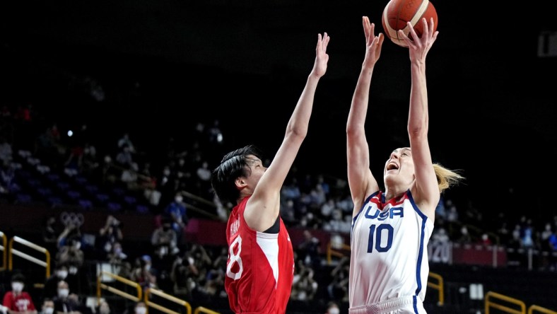 Aug 8, 2021; Saitama, Japan; United States forward Breanna Stewart (10) shoots the ball against Japan centre Maki Takada (8) in the women's basketball gold medal match during the Tokyo 2020 Olympic Summer Games at Saitama Super Arena. Mandatory Credit: James Lang-USA TODAY Sports