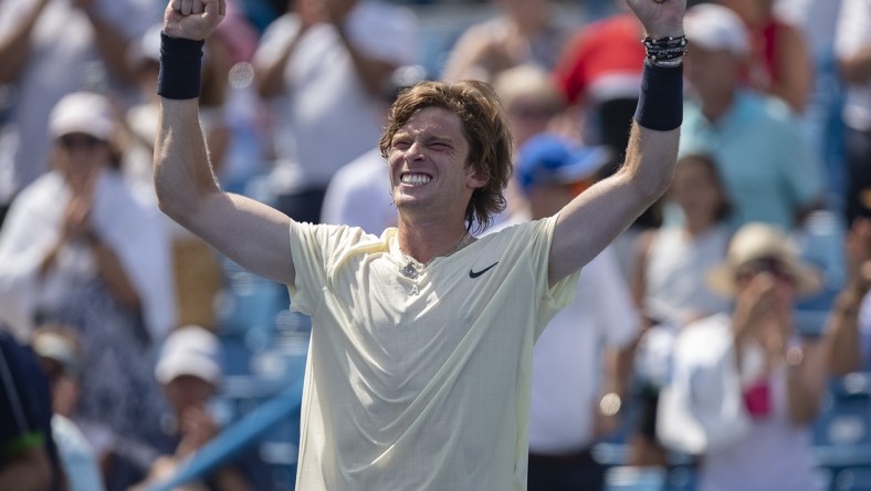 Aug 20, 2021; Mason, OH, USA; Andrey Rublev (RUS) celebrates winning his match against Benoit Paire (FRA not pictured) during the Western and Southern Open at the Lindner Family Tennis Center. Mandatory Credit: Susan Mullane-USA TODAY Sports