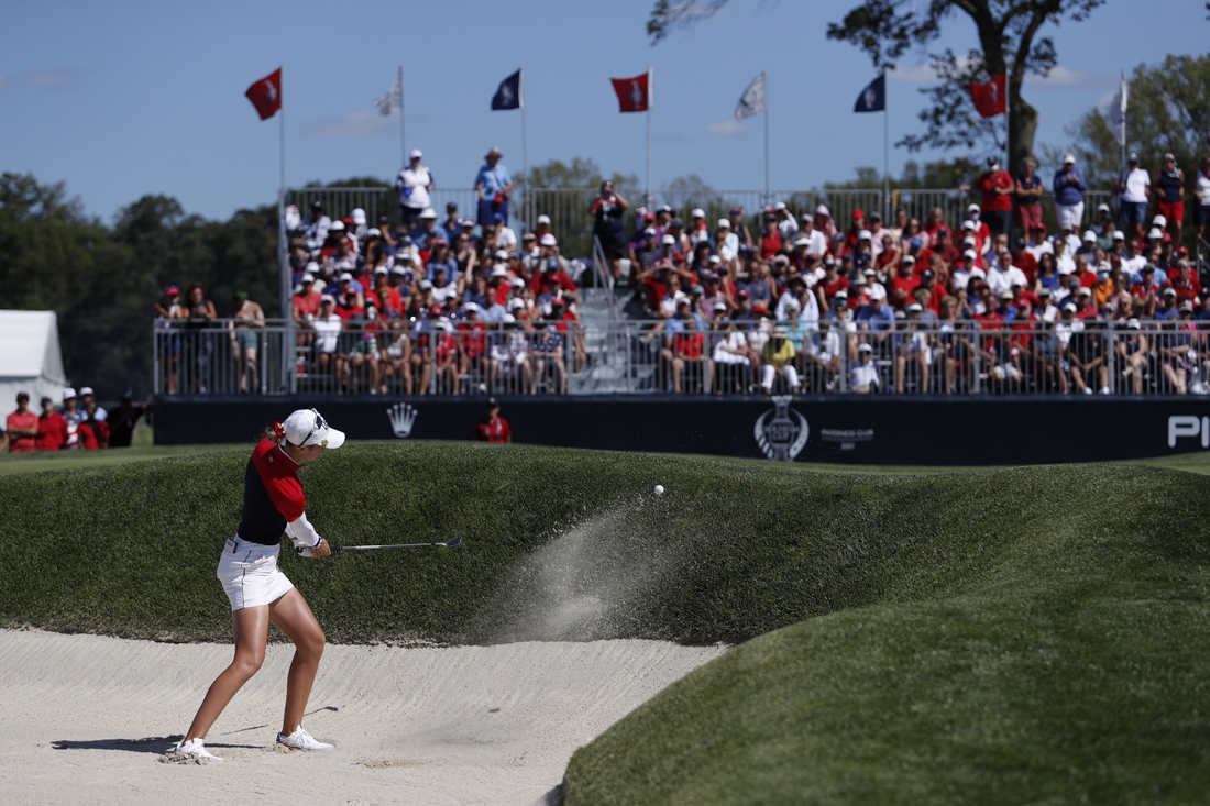 Sep 6, 2021; Toledo, Ohio, USA; Nelly Korda of Team USA hits a bunker shot on the twelfth hole during singles matches in the 2021 Solheim Cup at Invernes Club. Mandatory Credit: Raj Mehta-USA TODAY Sports