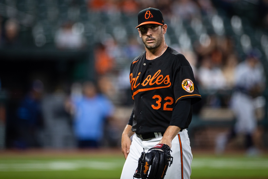 Aug 27, 2021; Baltimore, Maryland, USA; Baltimore Orioles starting pitcher Matt Harvey (32) looks on against the Tampa Bay Rays at Oriole Park at Camden Yards. Mandatory Credit: Scott Taetsch-USA TODAY Sports