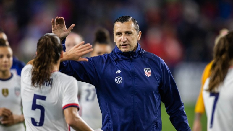 Sep 21, 2021; Cincinnati, Ohio, USA; United States head coach Vlatko Andonovski high fives defender Kelley O'Hara (5) after an international friendly soccer match against Paraguay at TQL Stadium. Mandatory Credit: Trevor Ruszkowski-USA TODAY Sports