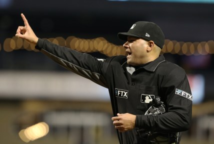 Sep 30, 2021; Pittsburgh, Pennsylvania, USA;  Home plate umpire Roberto Ortiz (40) gestures during the game between the Chicago Cubs and the Pittsburgh Pirates during the seventh inning at PNC Park. Mandatory Credit: Charles LeClaire-USA TODAY Sports