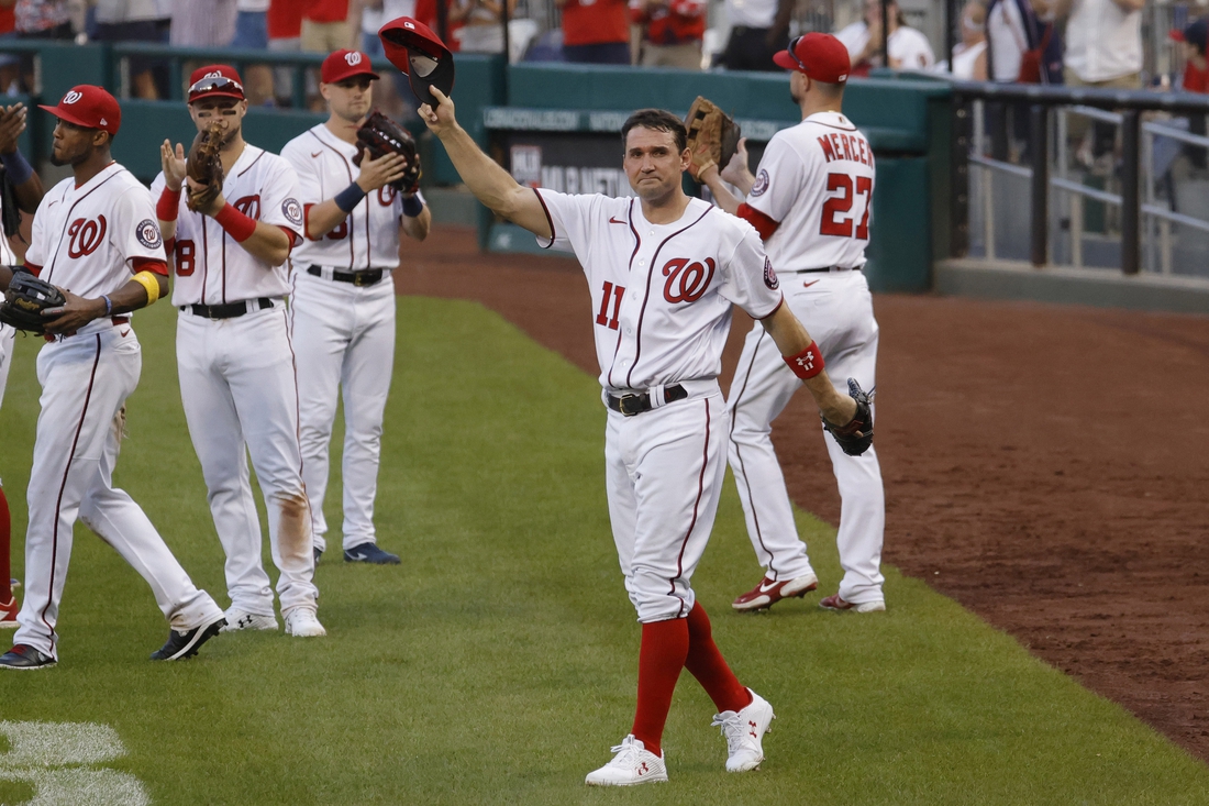 Oct 3, 2021; Washington, District of Columbia, USA; Washington Nationals first baseman Ryan Zimmerman (11) waves to the crowd after being removed from the game against the Boston Red Sox during the eighth inning at Nationals Park. Mandatory Credit: Geoff Burke-USA TODAY Sports