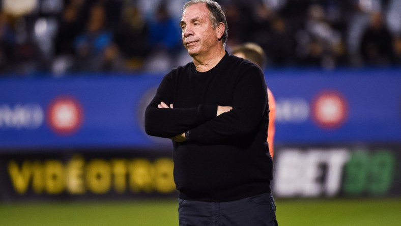 Sep 29, 2021; Montreal, Quebec, CAN; New England Revolution head coach Bruce Arena looks at the play during the second half at Stade Saputo. Mandatory Credit: David Kirouac-USA TODAY Sports