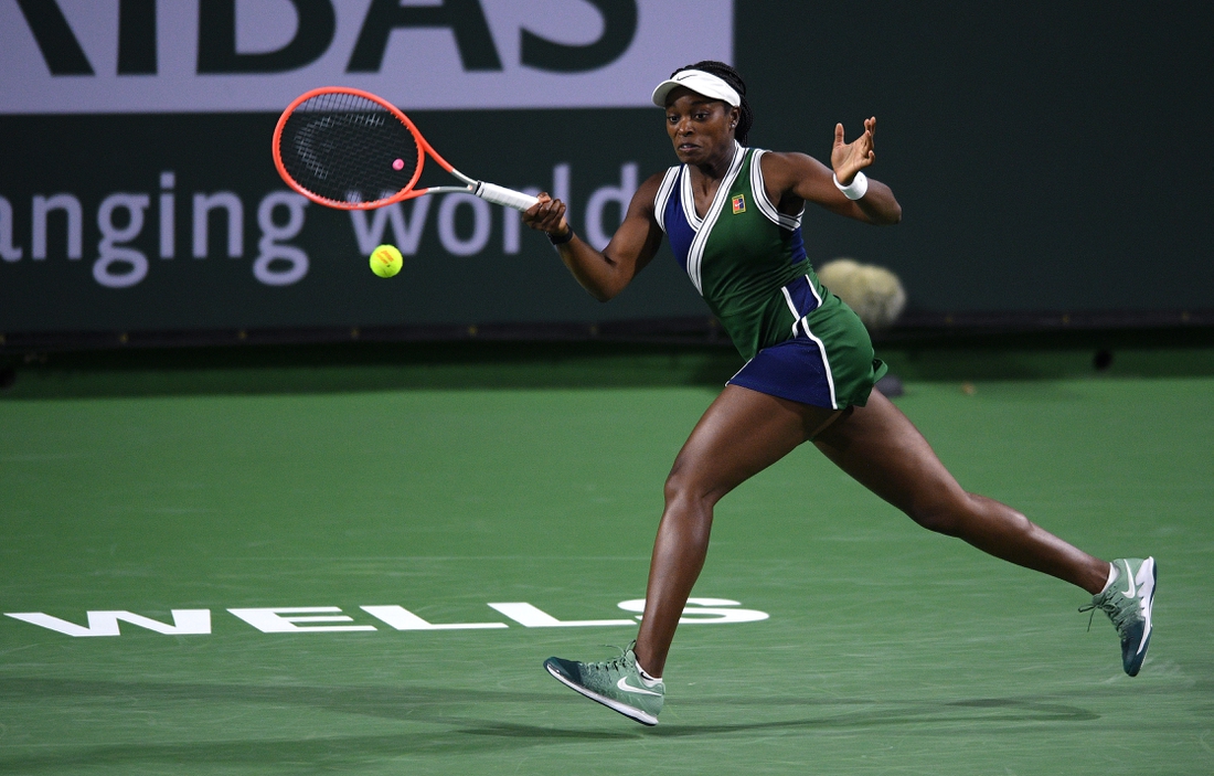 Oct 8, 2021; Indian Wells, CA, USA; Sloane Stephens (USA) hits a shot against Jessica Pegula (USA) at Indian Wells Tennis Garden. Mandatory Credit: Orlando Ramirez-USA TODAY Sports