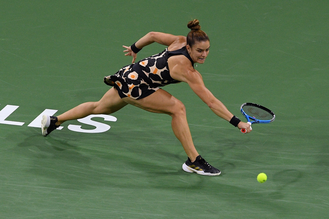 Oct 9, 2021; Indian Wells, CA, USA; Maria Sakkari (GRE) hits a shot against Viktorija Golubic (SUI) at Indian Wells Tennis Garden. Mandatory Credit: Orlando Ramirez-USA TODAY Sports