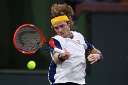 Oct 9, 2021; Indian Wells, CA, USA; Andrey Rublev (RUS) hits a shot against Carlos Taberner (ESP) at Indian Wells Tennis Garden. Mandatory Credit: Orlando Ramirez-USA TODAY Sports