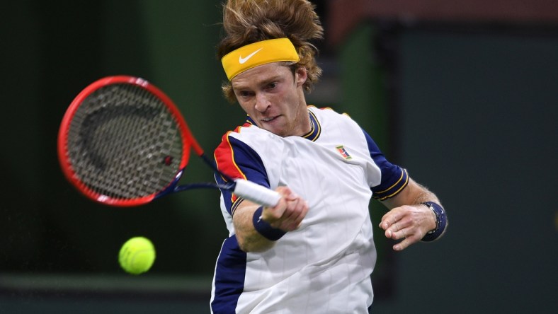 Oct 9, 2021; Indian Wells, CA, USA; Andrey Rublev (RUS) hits a shot against Carlos Taberner (ESP) at Indian Wells Tennis Garden. Mandatory Credit: Orlando Ramirez-USA TODAY Sports