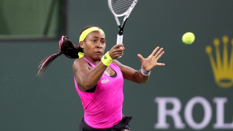 Coco Gauff of the United States returns a shot to Paula Badosa in the first set on Stadium One during the BNP Paribas Open in Indian Wells, Calif., on October 11, 2021.

Gauff Vs Badosa Bnp Paribas2085