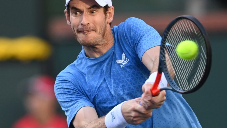 Oct 12, 2021; Indian Wells, CA, USA; Andy Murray (GBR) hits a shot against Alexander Zverev (GER) during a third round match in the BNP Paribas Open at the Indian Wells Tennis Garden. Mandatory Credit: Jayne Kamin-Oncea-USA TODAY Sports