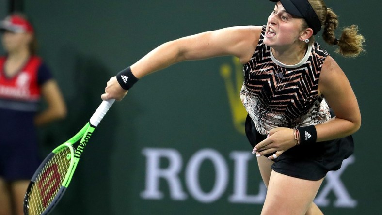 Jelena Ostapenko serves to Victoria Azarenka in their semifinal match at the BNP Paribas in Indian Wells, Calif., on October 15, 2021.

Azarenka Vs Ostapenko Bnp Paribas2163