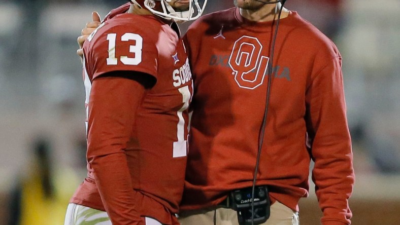 OU coach Lincoln Riley and quarterback Caleb Williams (13).