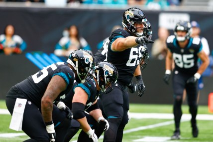 Oct 17, 2021; London, England, United Kingdom;  Jacksonville Jaguars center Tyler Shatley (69) directs the line against the Miami Dolphins at Tottenham Hotspur Stadium. Mandatory Credit: Nathan Ray Seebeck-USA TODAY Sports