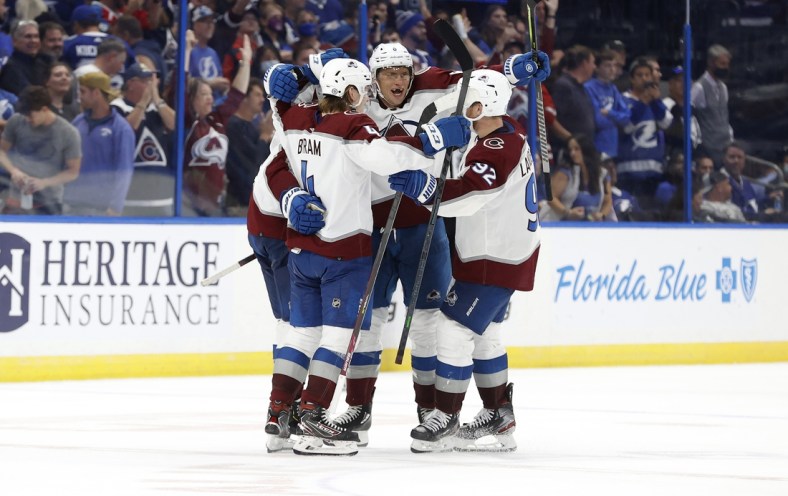 Oct 23, 2021; Tampa, Florida, USA; Colorado Avalanche defenseman Cale Makar (8) celebrates after scoring the game winning goal against the Tampa Bay Lightning during a shoot out at Amalie Arena. Mandatory Credit: Kim Klement-USA TODAY Sports